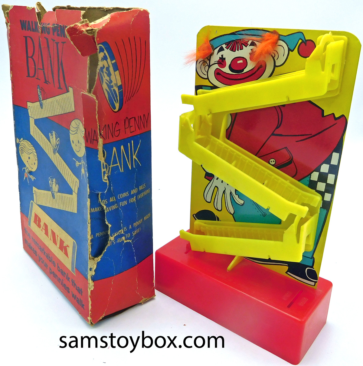Clown w/red base and yellow ramps Walking Penny Bank by Tigrett Industries